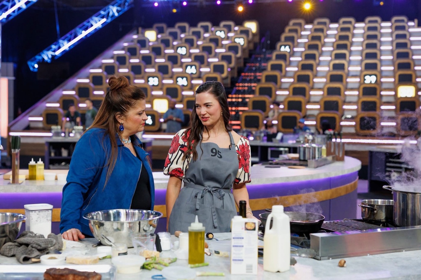 Holley at her cooking station on 100 Cooks