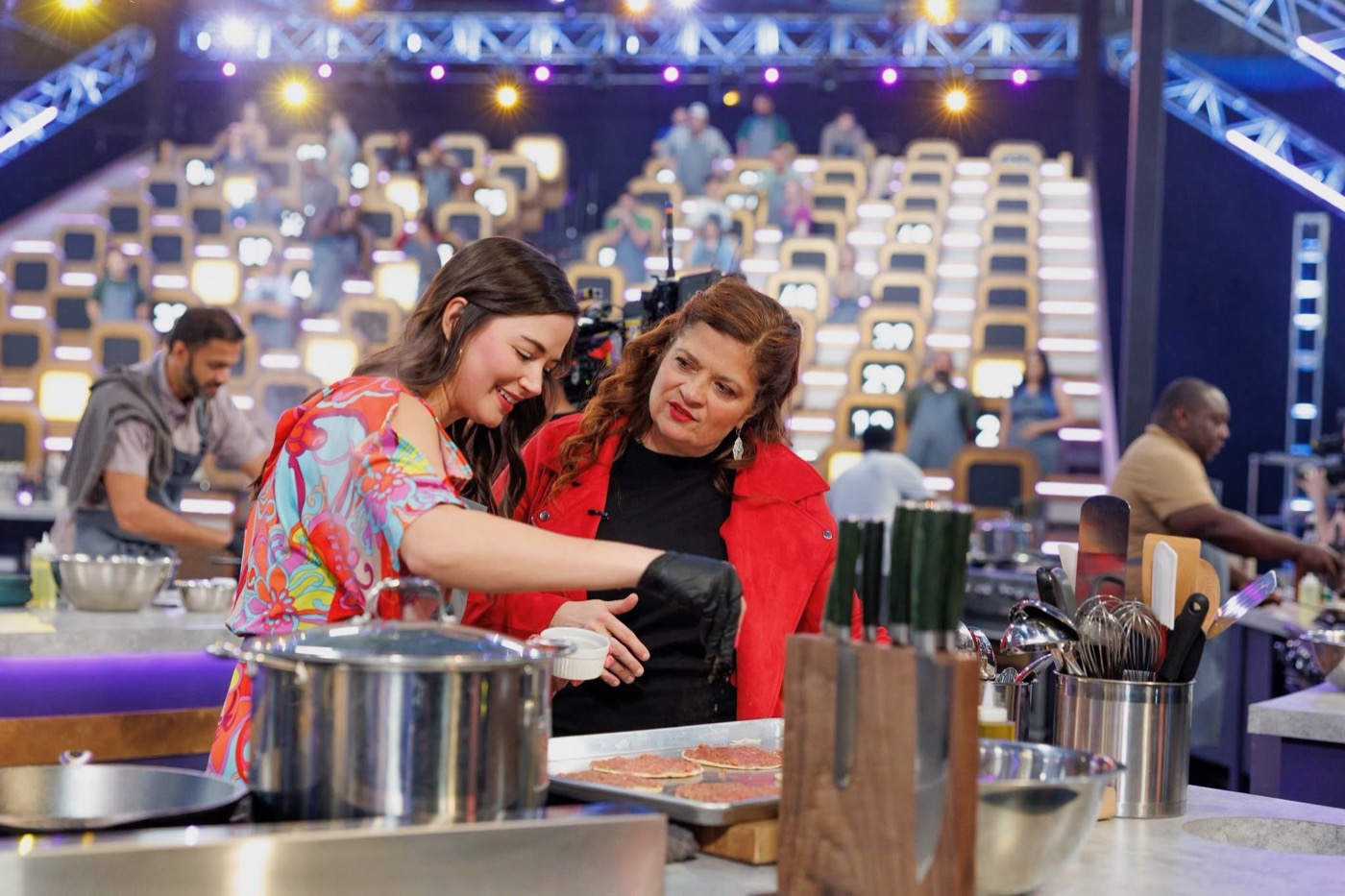 Holley cooking on the 100 Cooks set
